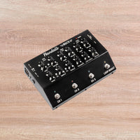 Angled view of Randall RG13 Guitar Pedal Amplifier on wooden background