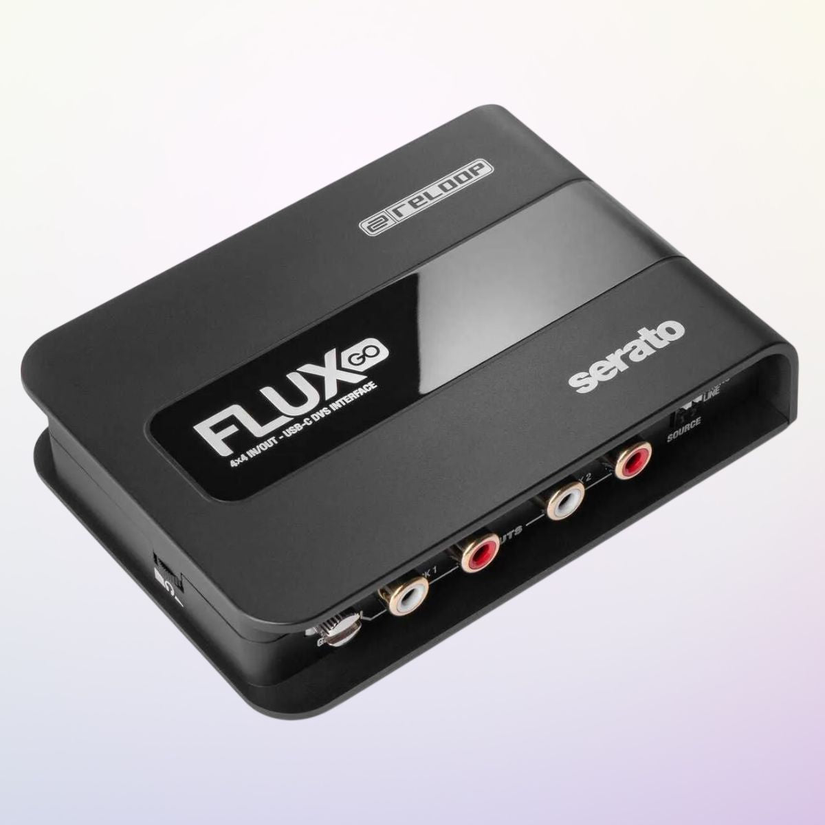 Angled view of Reloop Flux Go USB-C DVS Interface for Serato DJ Pro on purple gradient background