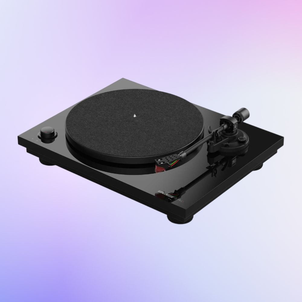 Angled view of Reloop TURN 3 MK2 Premium Hi-Fi Turntable on purple background