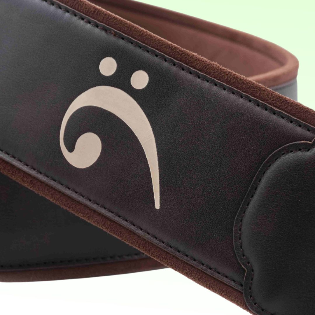 Close up view of RightOn Fakey Bass Strap on green background