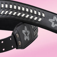 Close up view of RightOn Paul Turner Signature Bass Strap (Black) on pink background