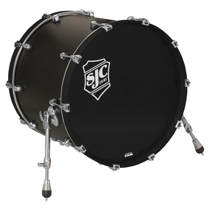 Angled view of SJC Drums Navigator 18" x 22" Bass Drum Ghost Black on white background