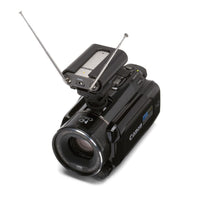 Canon video camera with antennas on a white background