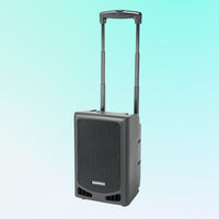 Gray portable speaker with wheels on a light blue background