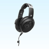 Angled view of Sennheiser HD 490 PRO Headphones on blue background