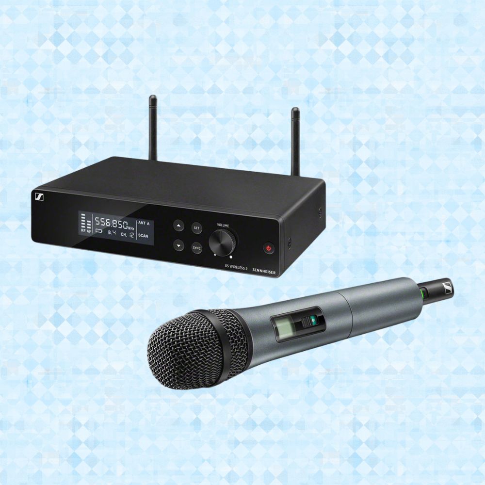 Inclusions of Sennheiser XSW 2-835-A Wireless Handheld Microphone System on blue background