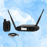 Inclusions of Shure GLXD14+ Digital Wireless Bodypack System on blue background