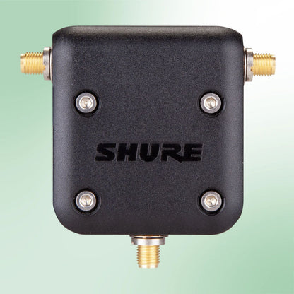 Front view of Shure UA221DB-RSMA Dual Band Passive Antenna Splitter on green background
