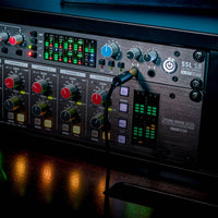 Close up angled front view of Solid State Logic SSL 18 USB Audio Interface in rack on mixing desk