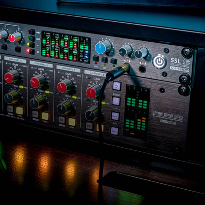 Close up angled front view of Solid State Logic SSL 18 USB Audio Interface in rack on mixing desk