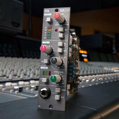 Angled front view of Solid State Logic SiX CH Module 500 Series on mixing console in studio