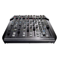 Angled front view of Solid State Logic SiX Desktop Analog Mixer on white background