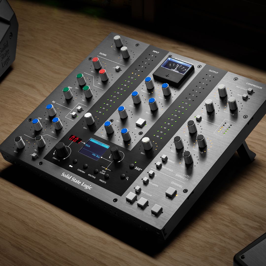 Angled view of Solid State Logic UC1 Advanced Plug-In Controller on wooden surface