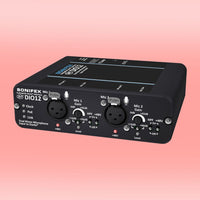 Angled front view of Sonifex AVN-DIO12 on pink background