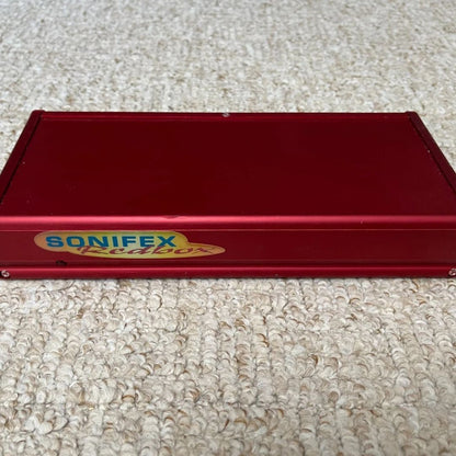 Top view of the front panel of Sonifex RB-MA1 on a beige carpet