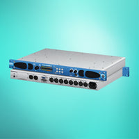 Pair of Sonifex RM-2S4 stacked displaying front and rear panels on turquoise background