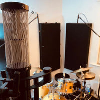 Close up view of Sontronics APOLLO 2 Stereo Ribbon Microphone facing the drums in studio