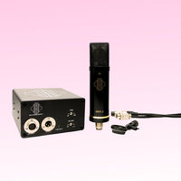 Front view of Sontronics ARIA 2 Tube Condenser Microphone, power supply, cable, and other inclusions on pink background
