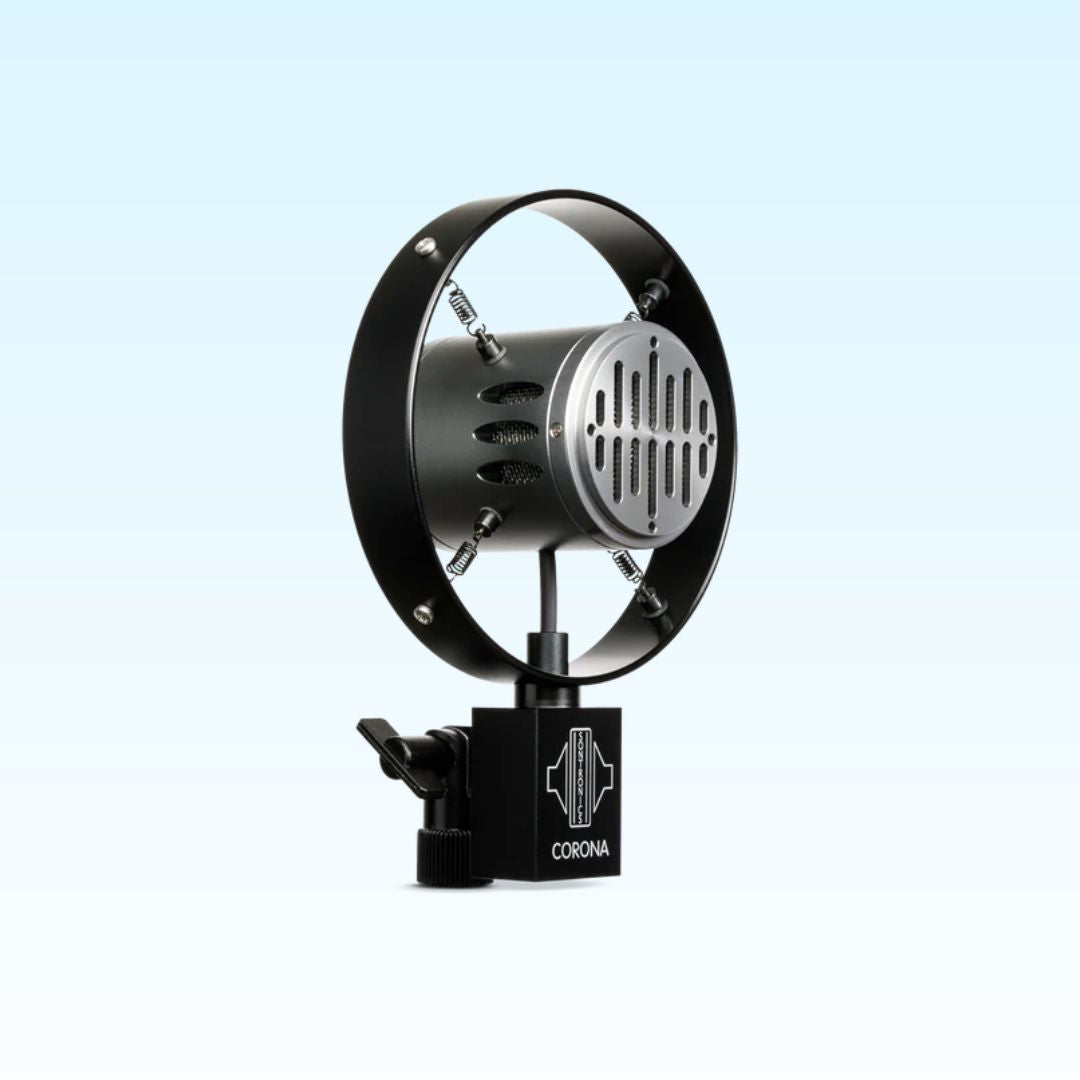 Angled view of Sontronics CORONA Live Vocal Dynamic Microphone on blue background