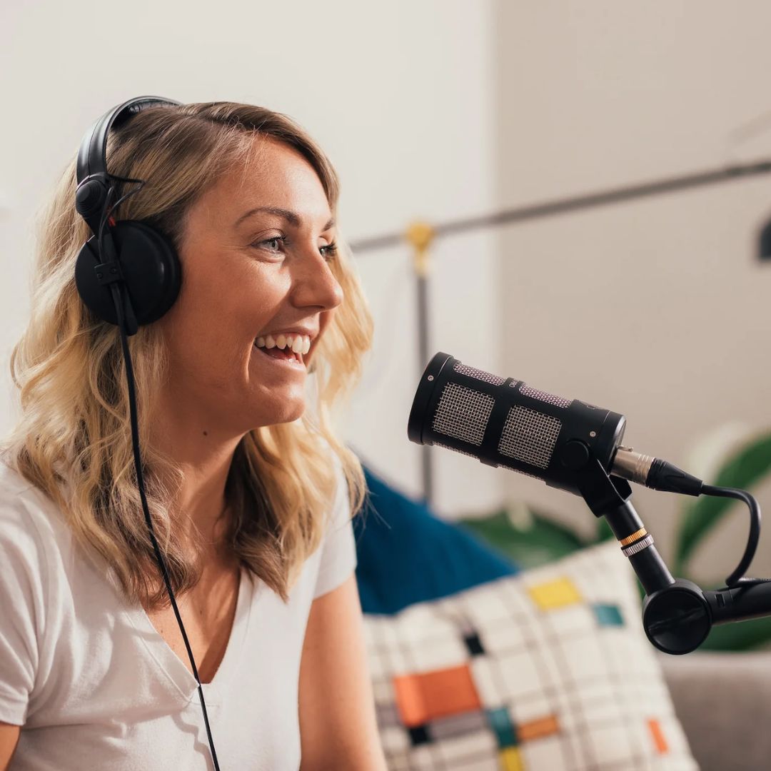 Person speaking into a Sontronics Podcast Pro Supercardioid Dynamic Broadcast Microphone Black in studio