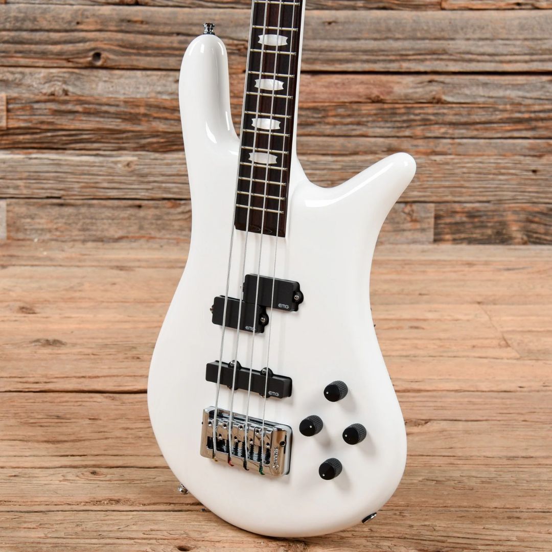 Angled close up view of Spector Euro 4 Classic Bass Guitar Solid White in wooden room