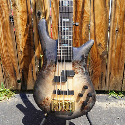 Close up front view of Spector Euro 5 CST Bass Guitar Natural Black Burst Gloss outdoors