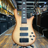 Close up front view of Spector Euro 5 LX Bass Guitar Natural Sunburst in music store