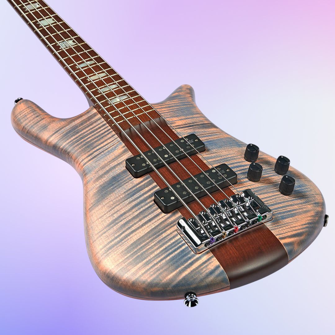 Angled close up front view of Spector Euro 5 RST Bass Guitar Sundown Glow Matte on purple gradient background