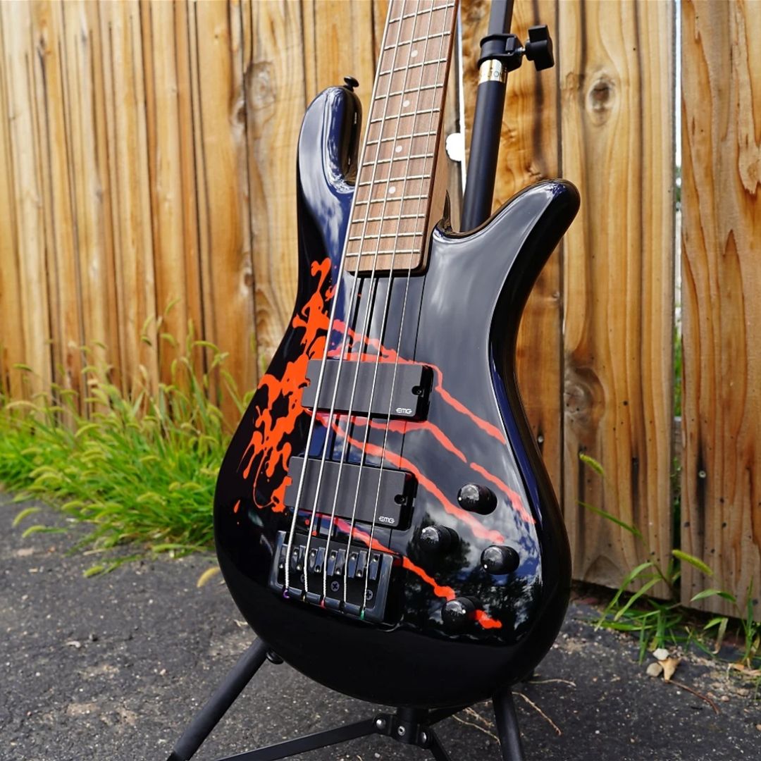 Close up front view of Spector Legend 5 Alex Webster Signature Bass Guitar on guitar stand outdoor