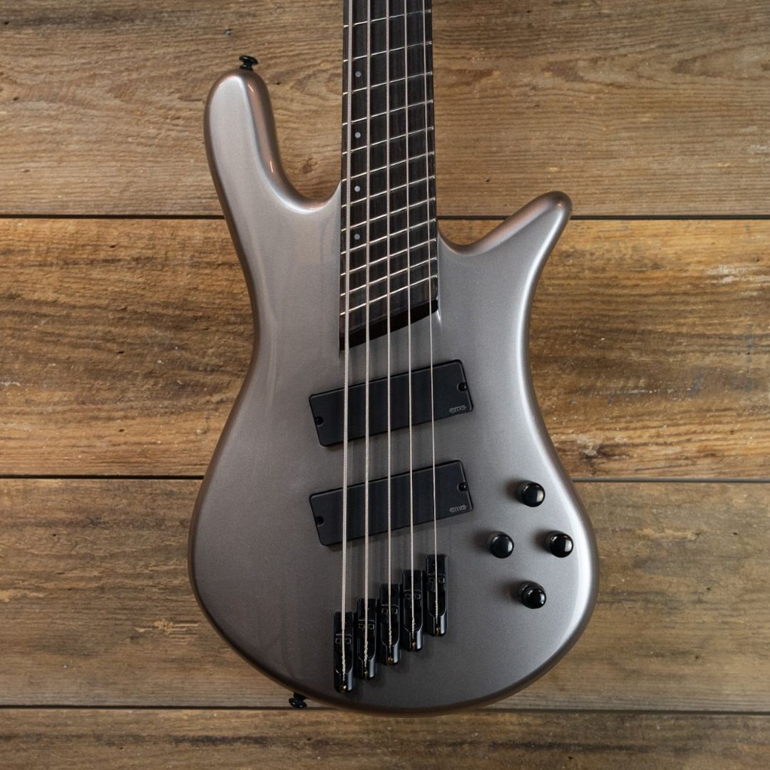 Close up front view of Spector NS Dimension HP 5-String Bass Guitar Gunmetal Gloss on wooden background