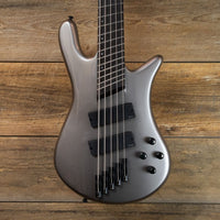 Close up front view of Spector NS Dimension HP 5-String Bass Guitar Gunmetal Gloss on wooden background
