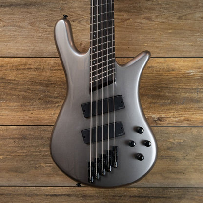 Close up front view of Spector NS Dimension HP 5-String Bass Guitar Gunmetal Gloss on wooden background