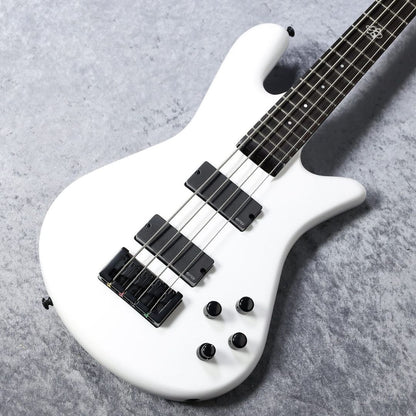 Angled close up view of Spector NS Ethos HP 4-String Bass Guitar White Sparkle Gloss on grey surface