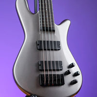 Close up front view of Spector NS Ethos HP 5-String Bass Guitar Gunmetal Gloss on purple background