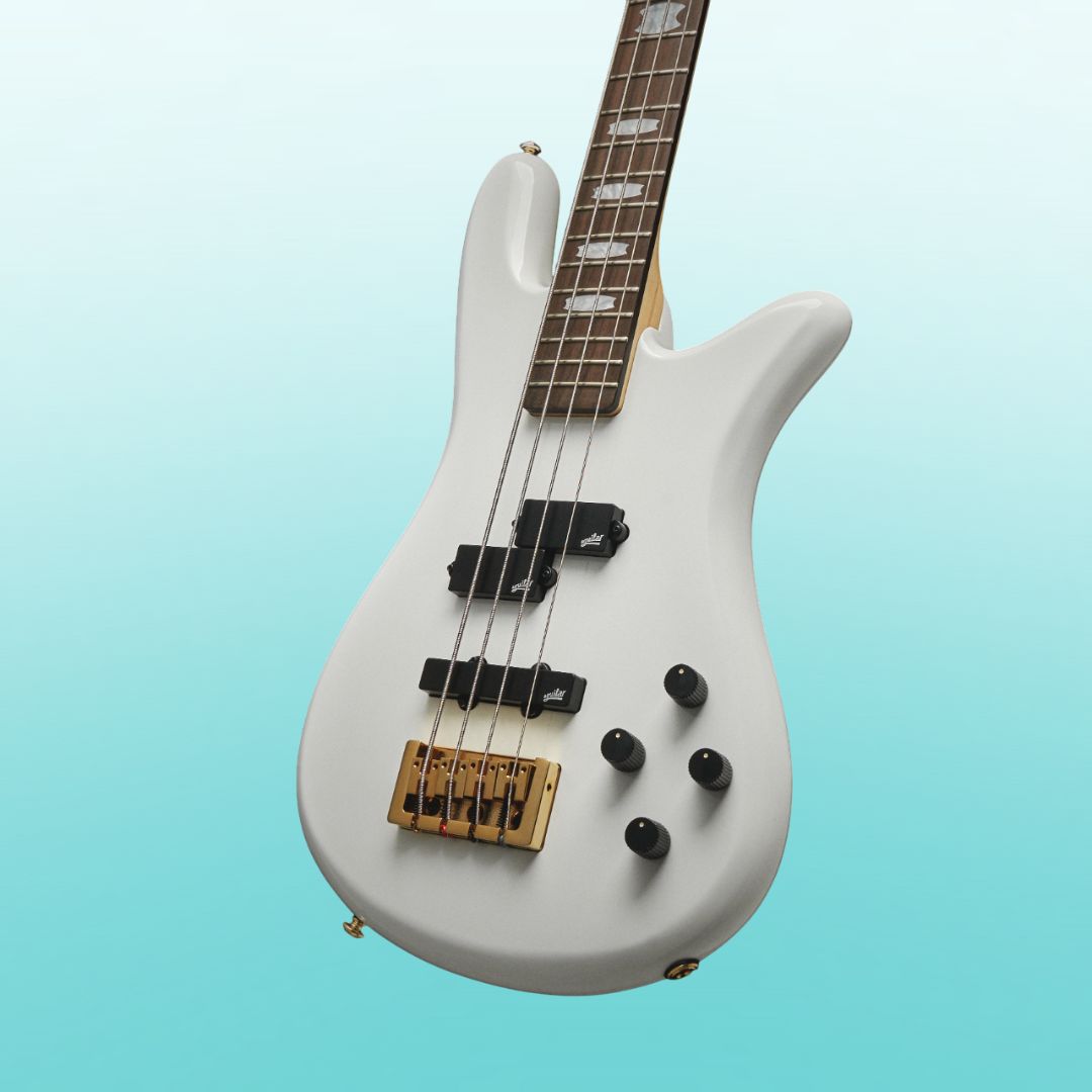 Close up angled view of Spector NS Icon Bolt-On 4-String Bass Guitar White Gloss on blue background