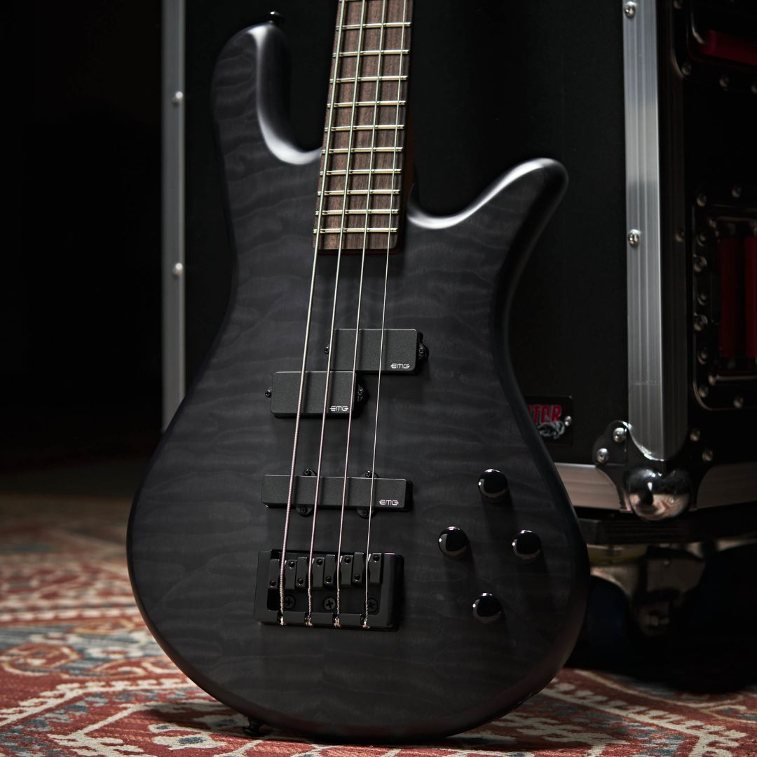 Close up front view of Spector NS Pulse II 4-String Bass Guitar (Black Stain Matte) leaning on flight case on top of carpet in studio