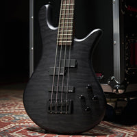 Close up front view of Spector NS Pulse II 4-String Bass Guitar (Black Stain Matte) leaning on flight case on top of carpet in studio