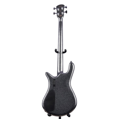 Black electric bass guitar on a white background