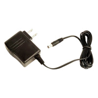 Side view of Strymon 9V Power Supply on white background