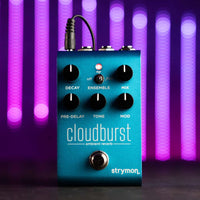 Front view of Strymon Cloudburst with purple-lit background