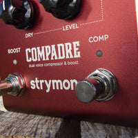 Close up view of Strymon Compadre on wooden surface