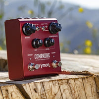 Angled view of Strymon Compadre on wooden surface with an outdoor background