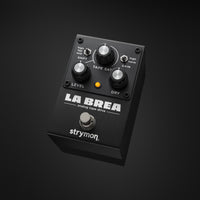 Angled view of Strymon La Brea Analog Tape Drive Pedal on black background