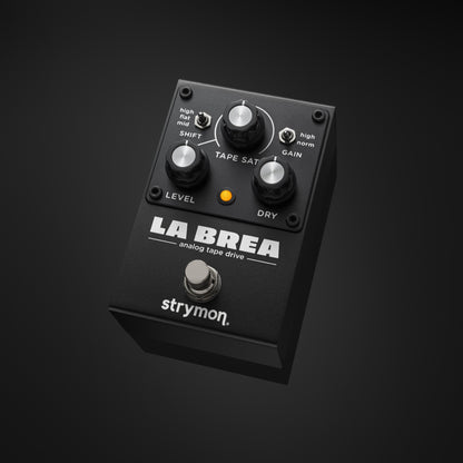 Angled view of Strymon La Brea Analog Tape Drive Pedal on black background