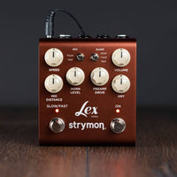 Front view of Strymon Lex on wooden surface with grey background
