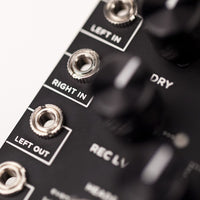 Close up view of Strymon Magneto Tape Delay & Looper Eurorack Module on white background