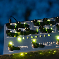 Angled front view of Strymon NightSky with blue background