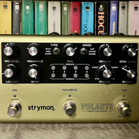 Front view of Strymon Volante with books in the background