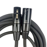 Coiled close up view of StudioFlex Ultra Silver Core XLR Cable (50') on white background