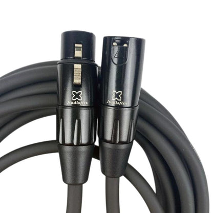 Coiled close up view of StudioFlex Ultra Silver Core XLR Cable (50') on white background